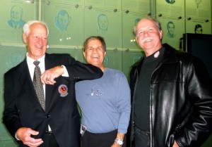 Receving an infamous Howe elbow alongside son Marty