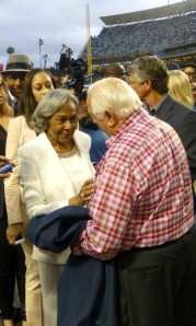 Rachel greets Tommy right in front of me after wrapping up pregame