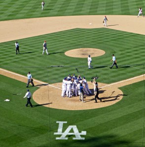 Homeplate celebration for Puig